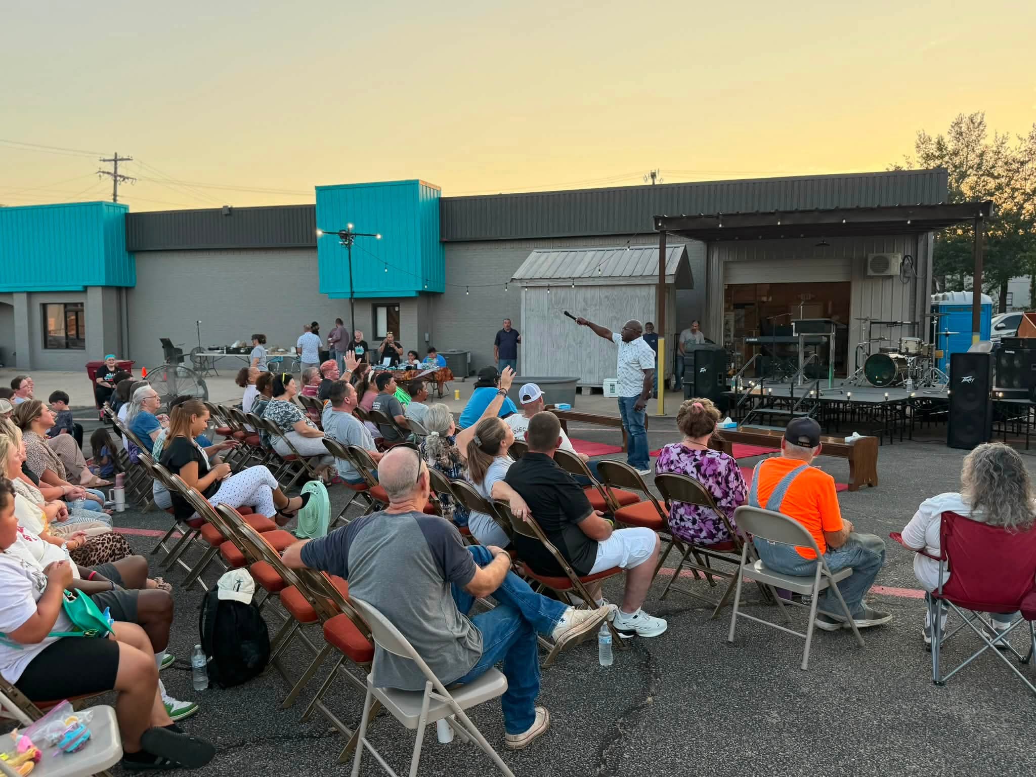 Outdoor worship gathering at Inner City Ministries in Paris, Texas.